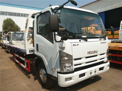 ISUZU KV600 Flat road - Camion de dépose de parpaings